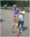 Kaitlyn and her dad, Dave have a great time with the stilts!